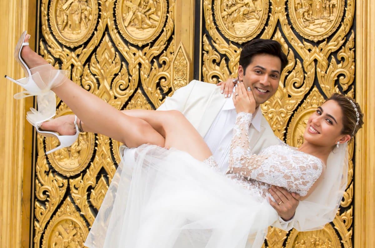 Sara Ali Khan and Varun Dhawan pose in all white