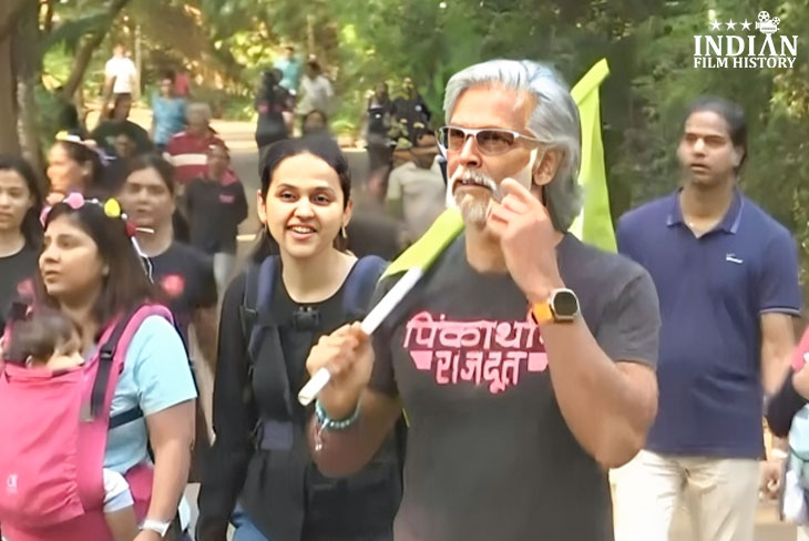 Milind Soman Promotes Mother Baby Bond Attends Pinkathon Baby Wearing Mother’s Walk