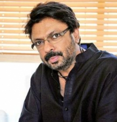 Bhansali began his career as an assistant to Vidhu Vinod Chopra and was involved in the making of Parinda, 1942: A Love Story and Kareeb. However, they had a falling-out when Bhansali refused to direct Kareeb. In 1996, he made his directorial debut with Khamoshi: The Musical, the commercially unsuccessful but critically acclaimed narration of a daughter's struggle to communicate with her deaf-mute parents.[3] The film earned the Critics Award for Best film at Filmfare. He rose to prominence in Indian cinema with a triangular love story, Hum Dil De Chuke Sanam, starring Aishwarya Rai, Salman Khan, and Ajay Devgan, which established his individualistic stamp for visual splendour and creating auras of celebration and festivity. The film was premiered in the Indian Panorama section at the 1999 International Film Festival of India. It was a great commercial and critical success, and won numerous awards including four National Awards and nine Filmfare Awards